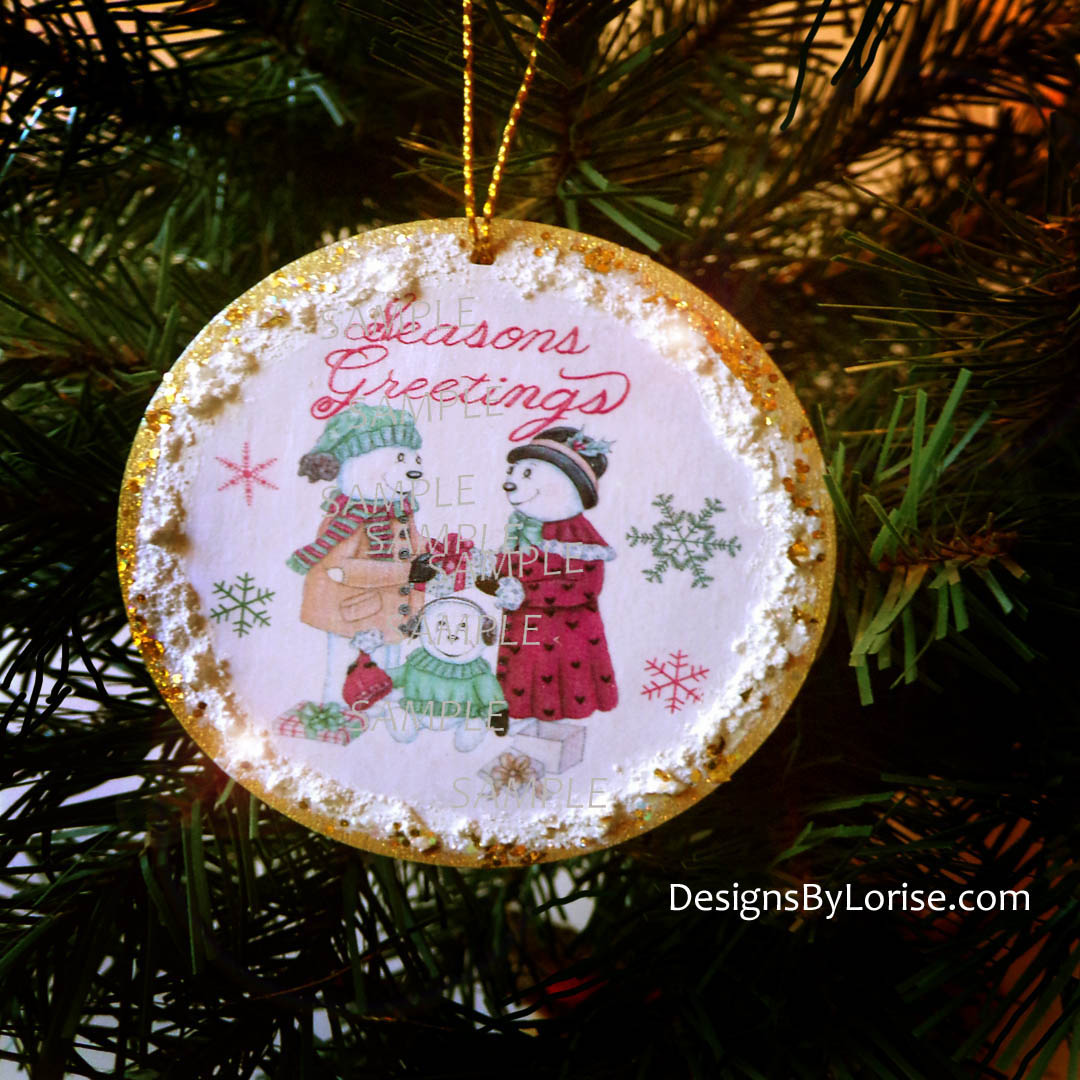 Snow Family Exchanging Presents Holiday Christmas Ornament